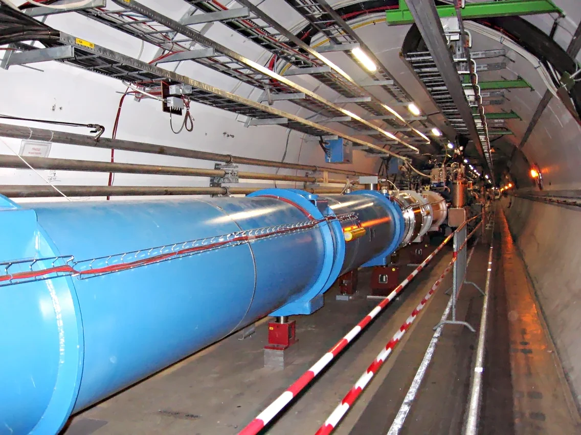 The Large Hadron Collider tunnel at CERN, stretching 27 kilometers beneath the Franco-Swiss border.